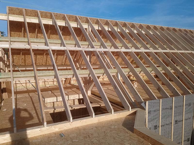 Charpente en bois pour maison ossature bois